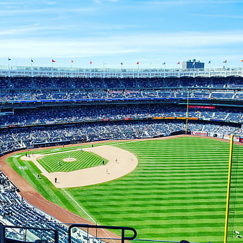 Yankee Stadium, baseball game, aerial view, sunny day, full crowd, drone shot, sports stadium, New York Yankees, baseball field, outdoor event, sports event
