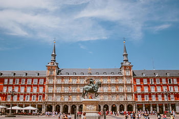Plaza Mayor, Madrid, historical architecture, red and white building, blue sky, Spain, tourist attraction, European landmarks, city square, travel destination, cultural heritage