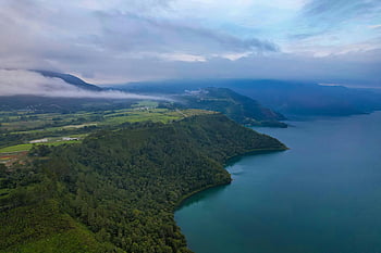 Lake Toba, Sumatra Island, Indonesia, aerial view, lush green coastline, North Sumatra, scenic view, natural landscape, tropical lake, volcanic lake, travel destination