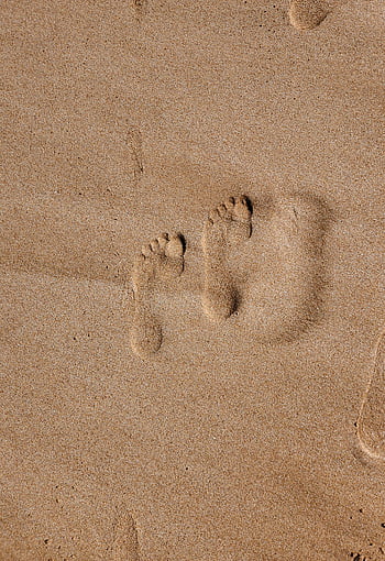 footprints in sand, Casablanca beach, Morocco, sandy beach, serene coastal, pair of footprints, Morocco beach, beach vibe, footprints Morocco, sandy Casablanca, coastal footprints
