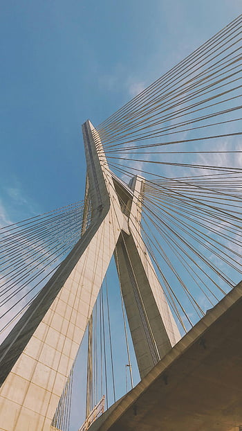 Ponte Estaiada, cable-stayed bridge, São Paulo, low angle shot, iconic bridge, Brazil, architectural design, modern bridge, urban infrastructure, clear sky, structural engineering
