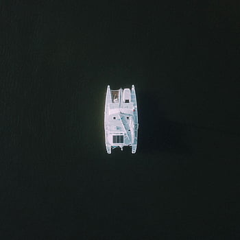 white boat, catamaran, aerial shot, calm waters, tranquility, top-down view, sailing, marine, watercraft, ocean, sea