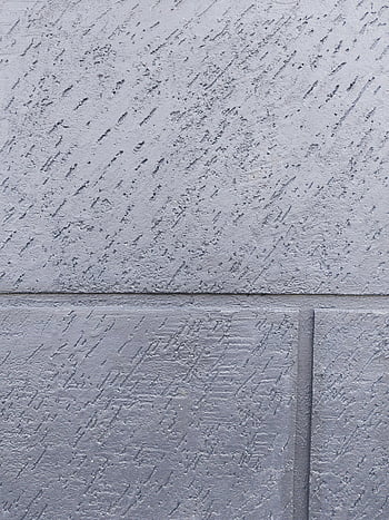 gray concrete wall, close-up shot, rough texture, textured surface, distinct patterns, concrete texture, wall texture, gray wall, concrete patterns, building material, architectural detail