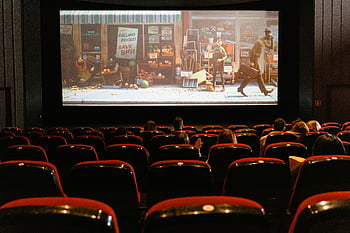 cartoon movie, theater screen, animated film, cozy indoor theater, small audience, movie theater, animated movie, theater audience, indoor movie theater, cartoon film, theater showing