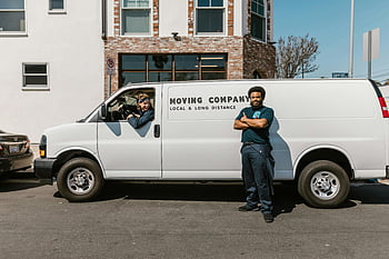 men working, moving company, company van, city street, ready for job, local long distance, moving services, professional movers, urban setting, work attire, transportation