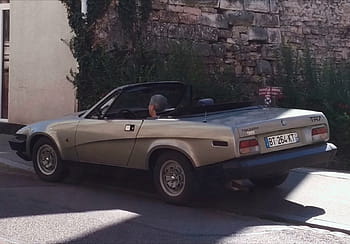 Triumph TR7, 1982, Cabrio, klassisches Auto, Chalon sur Saone, Jahrgang, Silber-, oben offen, Rückansicht, Nummernschild, geparkt