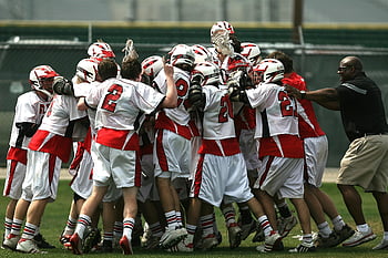 lacrosse players, celebrating victory, coach, daytime, field, team, sports, celebration, group, uniform, huddle