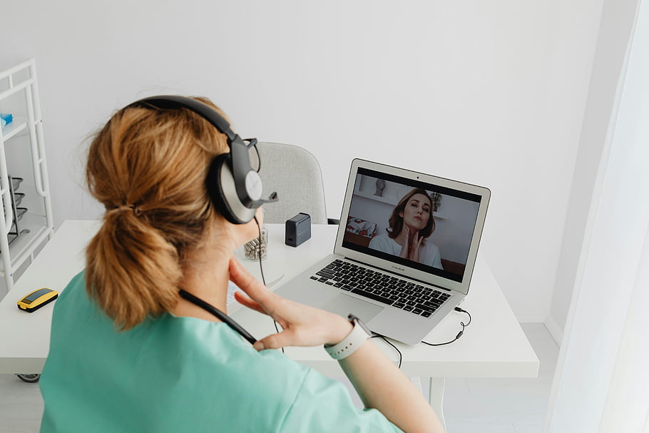 telemedicine, online appointment, doctor consultation, laptop, medical scrubs, woman, telehealth, virtual meeting, healthcare, remote consultation, headphones