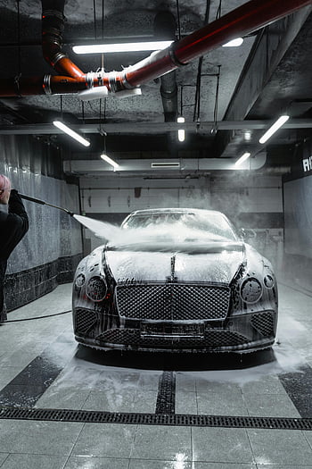 Bentley Continental GT, car wash, high-pressure hose, foam, luxury car, vehicle cleaning, auto detailing, car maintenance, indoor car wash, car care, Bentley