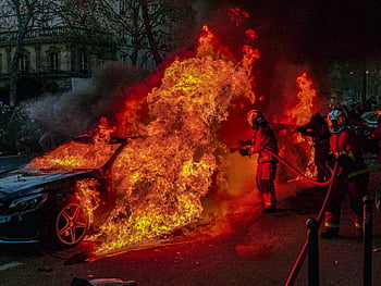firefighters, extinguishing, burning car, Paris, street fire, intense photo, car fire, emergency response, urban firefighting, night scene, rescue operation