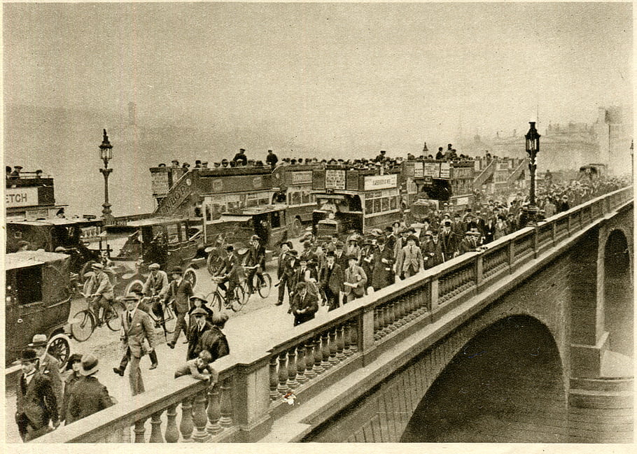 London Bridge, commuters, 1920s, sepia, urban scene, nostalgia, morning traffic, photogravure, TS Eliot, Wonderful London, St John Adcock