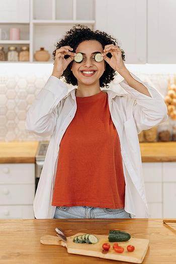 woman, cucumber slices, eyes, smiling, kitchen, healthy lifestyle, cucumbers, eye mask, natural beauty, skincare, vegetables