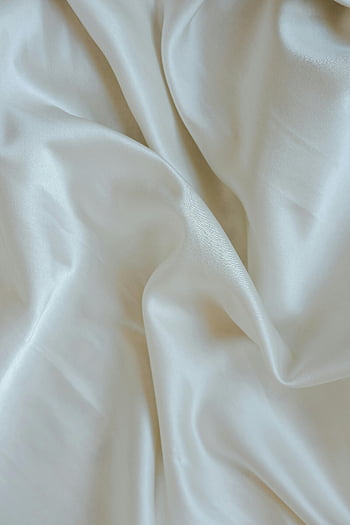 white silk, smooth texture, elegant fabric, close-up, soft material, white fabric, silk texture, fabric texture, white silk fabric, elegant texture, smooth silk