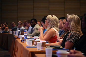 administration group, conference room, diverse group, business professionals, attentive audience, meeting room, conference session, professional gathering, business meeting, group discussion, corporate event