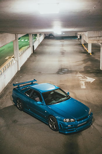 modré sportovní auto, parkovací garáž, vysoký úhel pohledu, betonové parkoviště, modrý sedan, sportovní auto, parkoviště, Interiér garáže, auto v garáži, modré vozidlo, pohled na garáž