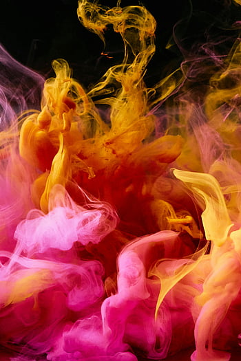 high-speed photography, colorful ink, diffusion in water, dynamic patterns, pink ink, yellow ink, abstract art, swirling ink, vivid colors, water photography, abstract photography