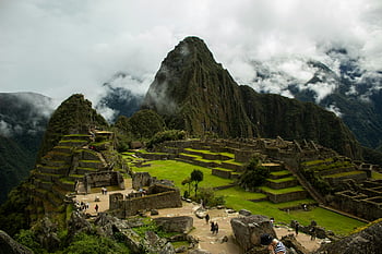Machu Picchu, Andes Mountains, Peru, ancient Inca ruins, explore Machu Picchu, Inca civilization, mountain ruins, travel Peru, historical site, South America, cloud-covered peaks