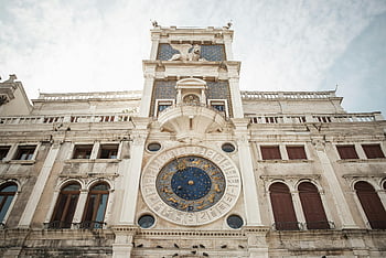 St. Marks Clocktower, Venice, historic facade, ornate clock, St Mark's Clocktower, historic architecture, Venetian architecture, clock tower, Venice landmarks, Italian landmarks, European landmarks
