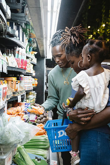 family, buying groceries, supermarket, fresh produce, supermarket aisle, shopping together, parents with child, grocery shopping, fresh vegetables, family time, shopping cart