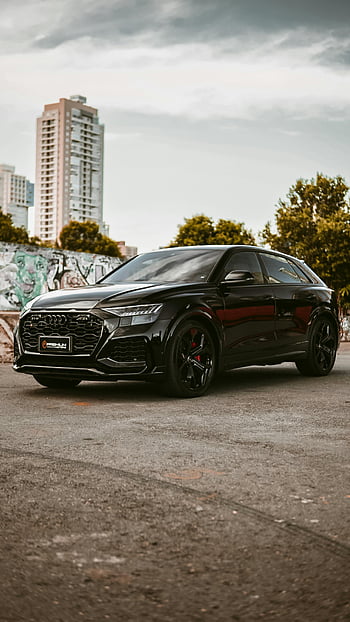 Black Audi, SUV, city pavement, skyline backdrop, urban automotive, black car, cityscape, modern architecture, luxury vehicle, street scene, urban setting
