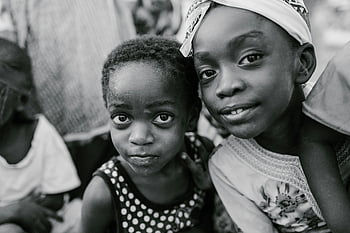 African children, black and white photo, cheerful smiles, friendship, candid photo, positive black kids, town street, African kids, black children, street photography, black and white photography