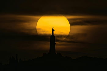 Cerro de los Angeles, Christ statue, sunset, Madrid, Spain, silhouette, dramatic sky, religious monument, evening view, landmark, travel destination