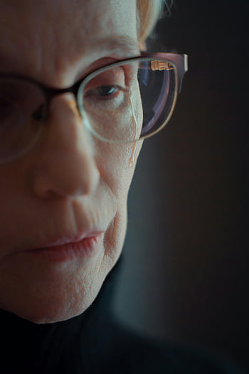 woman crying, close-up shot, senior woman, glasses, tear, poignant portrait, emotional moment, facial expression, close-up portrait, elderly woman, emotional tears