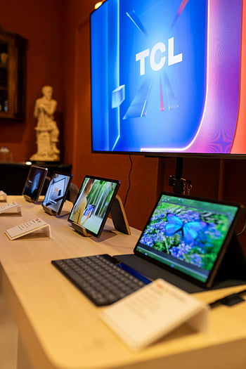 electronics, tablets, display, store, TCL screen, vertical shot, various tablets, store display, electronic devices, technology products, digital devices
