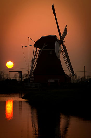 holländische Windmühle, Silhouette, lebendiger Sonnenuntergang, traditionelle Windmühle, szenische Ansicht, Sonnenuntergang Reflexion, Wassermühle, Sonnenuntergangszene, Windmühle Silhouette, holländische Landschaft, Sonnenuntergang Landschaft