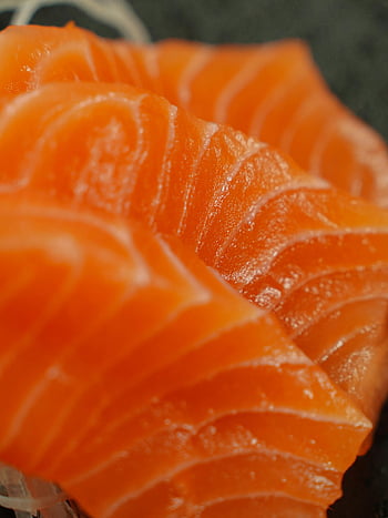 raw salmon, close-up, fresh salmon, sashimi, food photography, appetizing, raw fish, salmon slices, seafood, gourmet, culinary