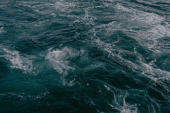 ocean water, splashing waves, dynamic view, captivating textures, ocean waves, water movement, sea texture, wave patterns, ocean surface, water dynamics, natural movement