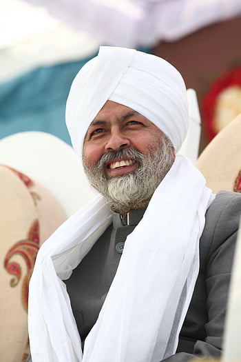 Sikh man, white turban, beard, smiling, outdoors, Gordhanpura, India, cultural attire, traditional clothing, portrait, male