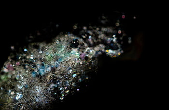 Crystal Glass, colorful bubbles, vibrant reflections, dark background, close-up abstract, soap bubbles, iridescent colors, bubble art, macro photography, artistic bubbles, dark contrast