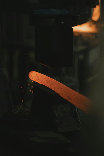 hot metal, glowing metal, blacksmithing, traditional skills, close-up, forging, sparks, craftsmanship, industrial, fire, heat