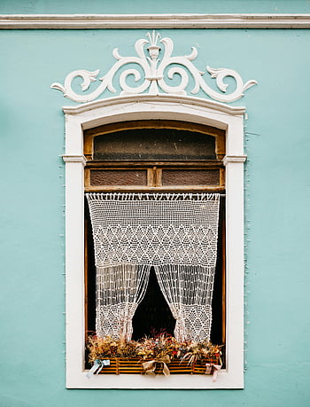 teal wall, ornate window, lace curtains, vintage architectural style, white curtain, window house, charming window, architectural details, vintage window, teal house, lace drapes