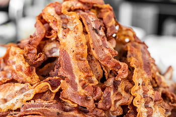 bacon, crispy bacon, cooked bacon, bacon strips, close up photography, delicious texture, bacon color, heap of bacon, food photography, bacon display, bacon texture
