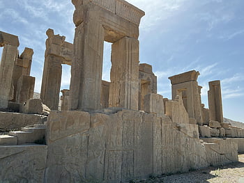 ruines de Persépolis, Iran ancien, empire achaemenid, ruines de pierre majestueuses, ciel clair, site historique, architecture ancienne, colonnes de Persépolis, Monuments iraniens, site archéologique, la civilisation ancienne