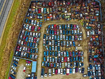 top view, junkyard, drone view, vintage vehicles, car junkyard, Rochester MN, aerial photo, sprawling junkyard, vintage cars, aerial view, car salvage yard