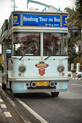 Bandros tour bus, Bandung, sightseeing experiences, vintage bus, city street, Bandung Tour on Bus, Bandung Juara, charming bus, Bandros 20, tour bus, Bandung sightseeing
