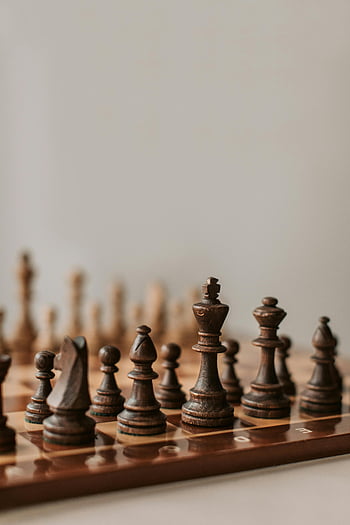 chess pieces, chess board, wooden chess, strategic play, close-up, chess game, chess strategy, chess set, chess pieces on board, chess photography, chess pieces detail