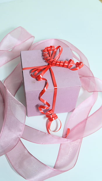 pink gift box, red ribbon, curled bow, festive occasions, elegant wrapping, gift wrapping, red band, pink ribbon, holiday gifts, present decoration, gift presentation