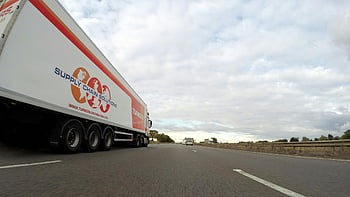 white trailer truck, concrete road, Supply Chain Solutions, semi truck, highway, cloudy sky, large truck, transportation, logistics, road transport, commercial vehicle