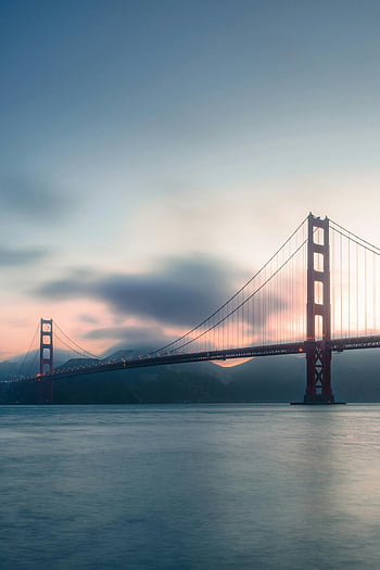 Golden Gate Bridge, San Francisco, sunset, ocean, calm waters, iconic bridge, red bridge, stunning view, evening sky, landmark, California