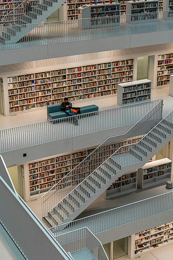 library, stairs, modern architecture, interior design, Stuttgart Germany, bookshelves, reading area, multi-level library, contemporary library, public library, book collection