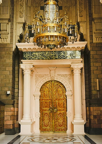 mosque, ornate golden door, chandelier, decorative columns, Medina, Saudi Arabia, detailed view, Islamic architecture, religious building, cultural landmark, Middle East