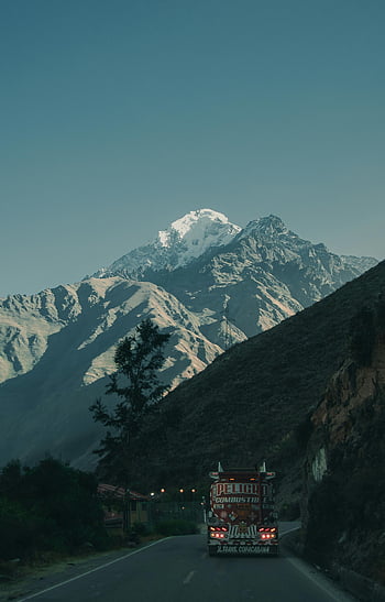 Andes Mountains, Ollantaytambo Peru, scenic road, tanker truck, mountain road, breathtaking view, natural landscape, travel photography, adventure travel, South America, Peru travel