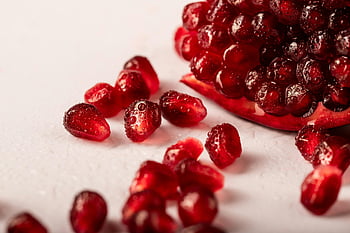 pomegranate seeds, close-up, red pomegranate, juicy seeds, droplets, vibrant, healthy food, fruit, close up, pomegranate arils, food photography