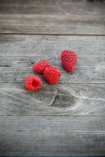 fresh raspberries, rustic wooden surface, close-up photos, healthy, natural, organic, unprocessed, vitamin c, food photography, texture, wooden background