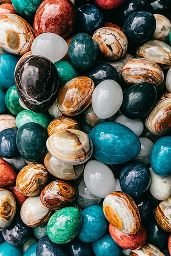 kleurrijke stenen, glanzende stenen, Gepolijste stenen, natuurlijke stenen, diverse kleuren, levendig assortiment, gestructureerde stenen, hoop stenen, diverse stenen, marmeren stenen, edelstenen