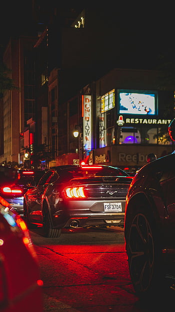 super car, luxury sports cars, neon signs, city street, night scene, dynamic scene, vibrant lights, urban nightlife, car wallpaper, street photography, night photography